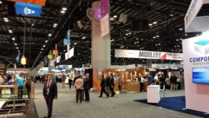 attendees walk around the show at NAFEM